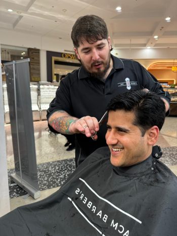 latest men's blog consulting with a skilled barber or hairstylist